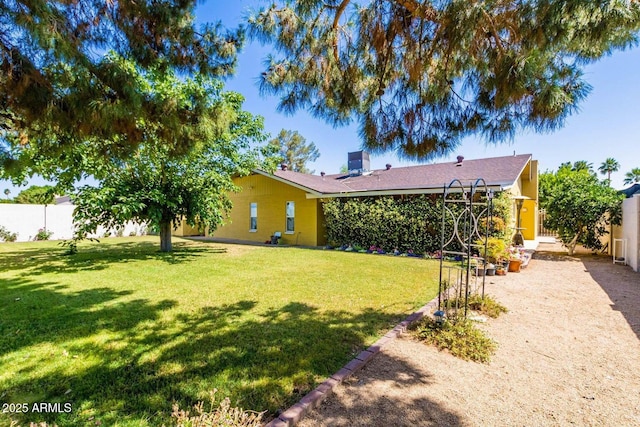 view of yard with fence