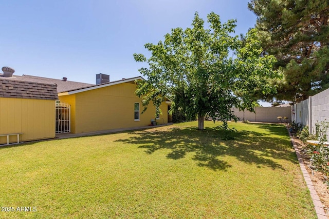 view of yard with fence