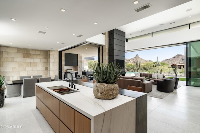 kitchen with a large island and sink