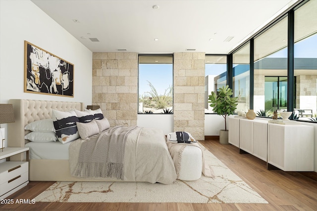 bedroom featuring light hardwood / wood-style flooring