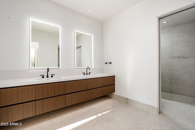 bathroom featuring vanity and tile patterned flooring