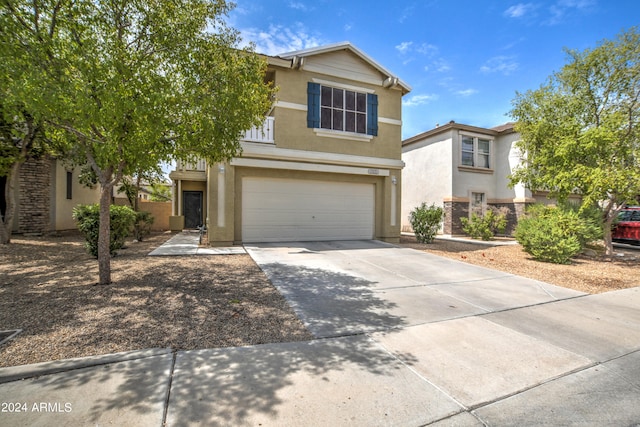 view of front of property with a garage