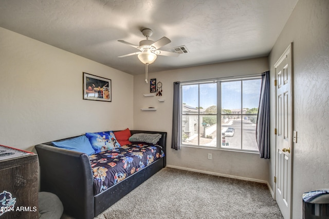 bedroom featuring carpet and ceiling fan