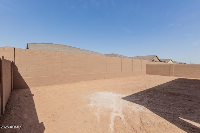 view of yard featuring a fenced backyard