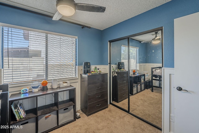 5911 E Evergreen St, Mesa, AZ 85205 - home office featuring a textured ceiling, a wainscoted wall, ceiling fan, and light colored carpet