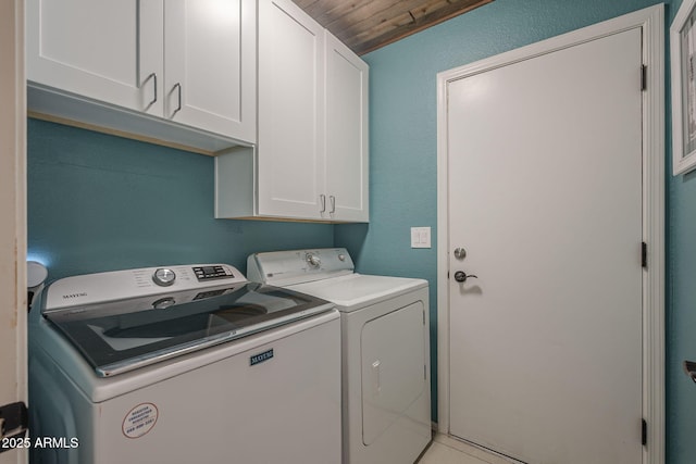 5911 E Evergreen St, Mesa, AZ 85205 - laundry room featuring washer and clothes dryer, cabinet space, and wooden ceiling