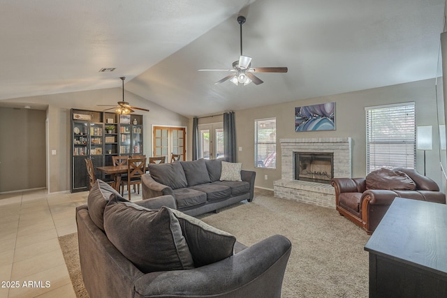 5911 E Evergreen St, Mesa, AZ 85205 - living area with a ceiling fan, vaulted ceiling, healthy amount of natural light, and a fireplace