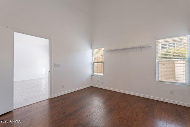 spare room with hardwood / wood-style floors