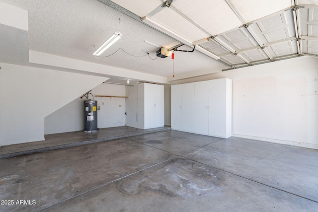 garage with a garage door opener and electric water heater