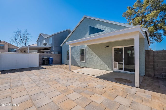 rear view of property with a patio area