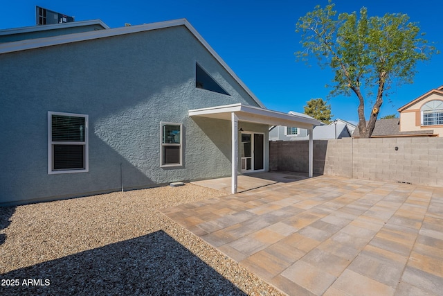 back of house featuring a patio