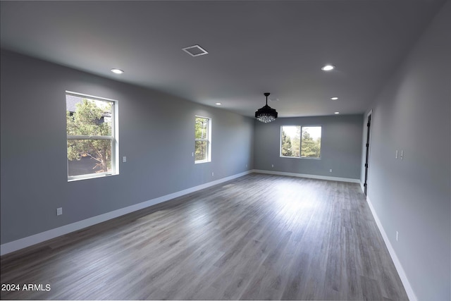 spare room featuring hardwood / wood-style floors