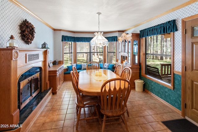 3910 Larson Loop, Forest Lakes, AZ 85931 - dining area with wallpapered walls, crown molding, healthy amount of natural light, light tile patterned floors, and a chandelier