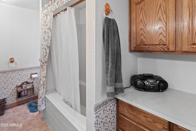 3910 Larson Loop, Forest Lakes, AZ 85931 - bathroom with wallpapered walls, shower / tub combo, and tile patterned floors