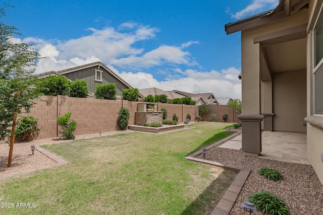 view of yard with a patio area
