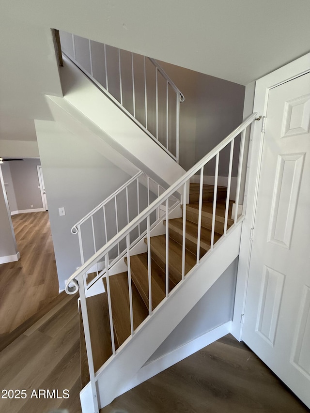 170 E Guadalupe Rd Unit 173, Gilbert, AZ 85234 - staircase with wood finished floors and baseboards