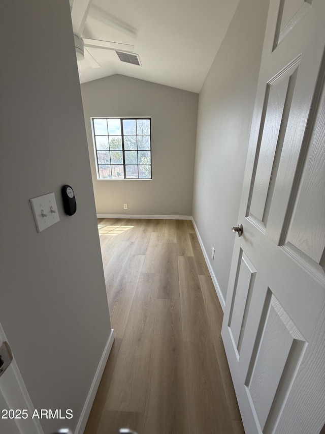 170 E Guadalupe Rd Unit 173, Gilbert, AZ 85234 - hallway with vaulted ceiling, baseboards, and wood finished floors