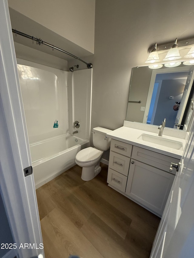 170 E Guadalupe Rd Unit 173, Gilbert, AZ 85234 - bathroom with vanity, shower / tub combination, wood finished floors, and toilet