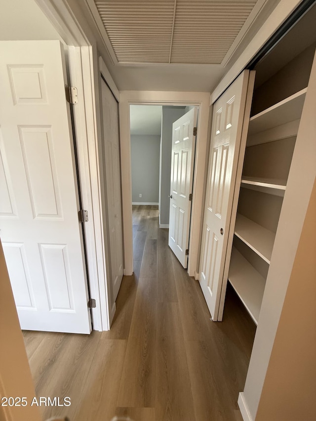 170 E Guadalupe Rd Unit 173, Gilbert, AZ 85234 - corridor featuring wood finished floors