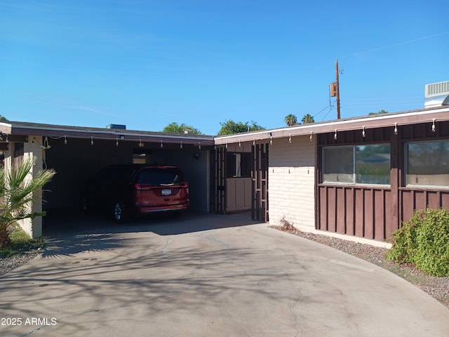 view of front of home with a carport