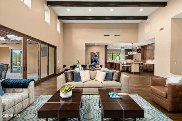 8454 E Leaning Rock Rd, Scottsdale, AZ 85266 - living room with visible vents, dark wood-style flooring, and beam ceiling