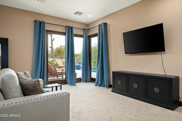 8454 E Leaning Rock Rd, Scottsdale, AZ 85266 - living room featuring recessed lighting, visible vents, and carpet floors