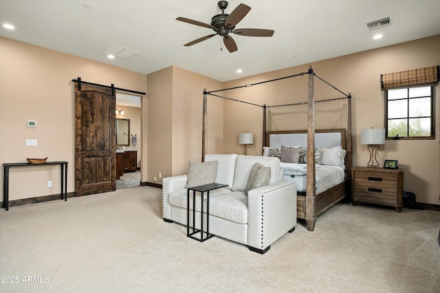 8454 E Leaning Rock Rd, Scottsdale, AZ 85266 - bedroom featuring light carpet, recessed lighting, a barn door, and visible vents