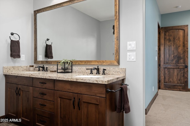 8454 E Leaning Rock Rd, Scottsdale, AZ 85266 - full bath featuring a sink, baseboards, and double vanity