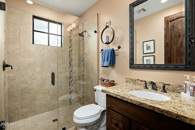 8454 E Leaning Rock Rd, Scottsdale, AZ 85266 - bathroom featuring a shower stall, visible vents, and toilet