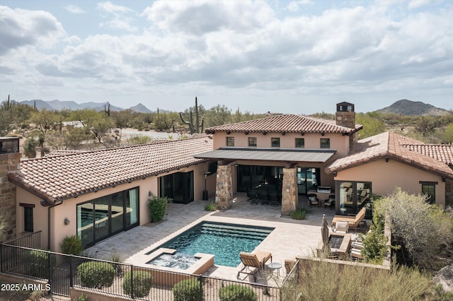 8454 E Leaning Rock Rd, Scottsdale, AZ 85266 - rear view of house featuring a mountain view, a tile roof, a patio, and a chimney