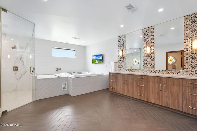2421 E Montebello Ave, Phoenix, AZ 85016 - bathroom featuring a bath, a shower stall, tasteful backsplash, and visible vents