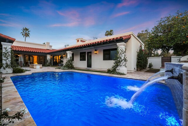 2421 E Montebello Ave, Phoenix, AZ 85016 - rear view of house with a tiled roof, a fenced in pool, fence, and a patio area