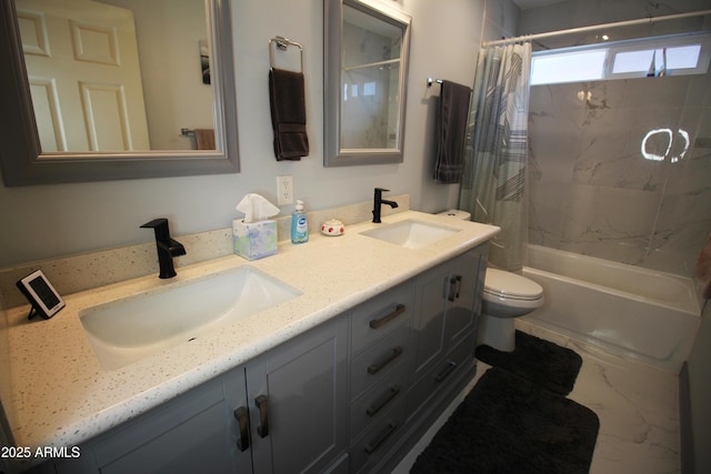 full bathroom featuring shower / bath combination with curtain, vanity, and toilet