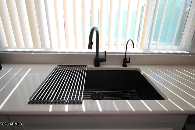 room details with sink and light stone counters