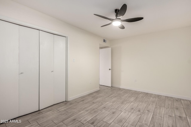 unfurnished bedroom with a closet and ceiling fan