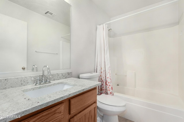 full bathroom with shower / bath combination with curtain, vanity, and toilet