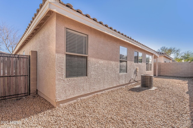 view of property exterior featuring central air condition unit