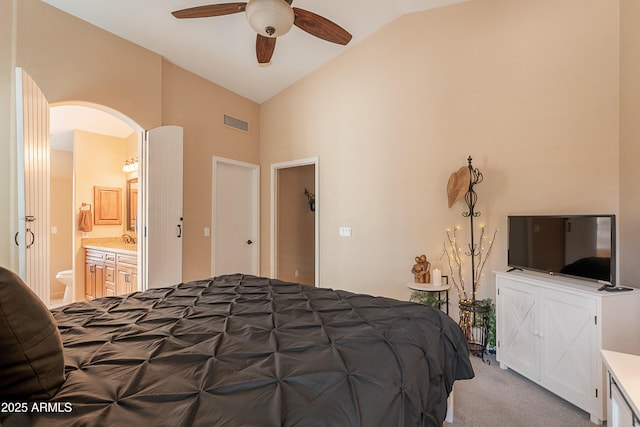 490 W Encinas St, Gilbert, AZ 85233 - bedroom featuring light colored carpet, arched walkways, high vaulted ceiling, and ensuite bathroom