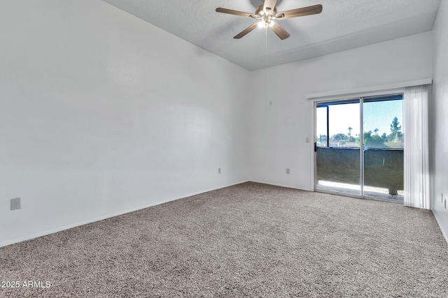 carpeted empty room featuring a textured ceiling and ceiling fan