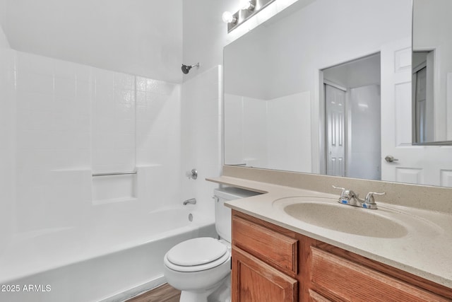 full bathroom with vanity, shower / bathtub combination, and toilet