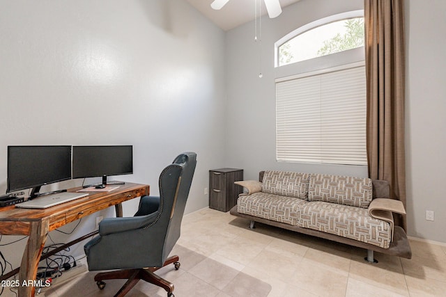 9678 E Voltaire Dr, Scottsdale, AZ 85260 - home office with a ceiling fan, vaulted ceiling, and light tile patterned floors