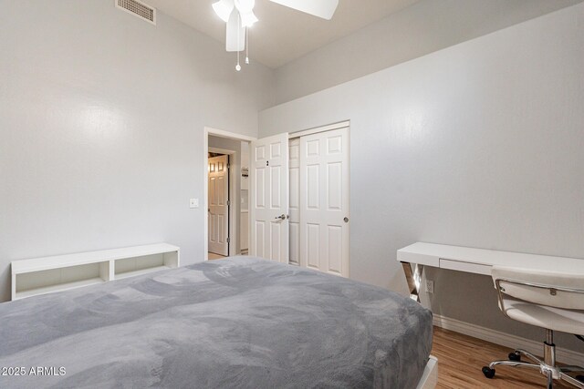 9678 E Voltaire Dr, Scottsdale, AZ 85260 - bedroom featuring wood finished floors, an office area, baseboards, a closet, and ceiling fan