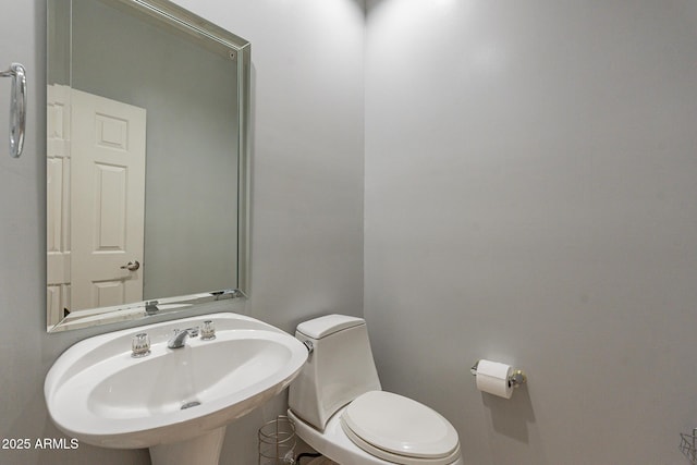 9678 E Voltaire Dr, Scottsdale, AZ 85260 - half bath with a sink and toilet