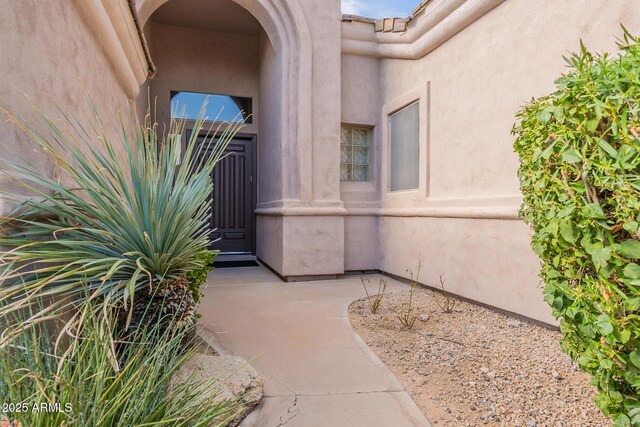 9678 E Voltaire Dr, Scottsdale, AZ 85260 - doorway to property with stucco siding