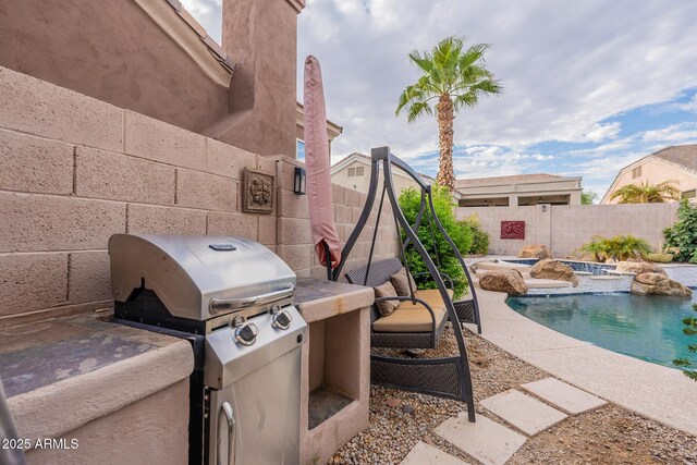 9678 E Voltaire Dr, Scottsdale, AZ 85260 - fenced backyard with grilling area and a pool with connected hot tub