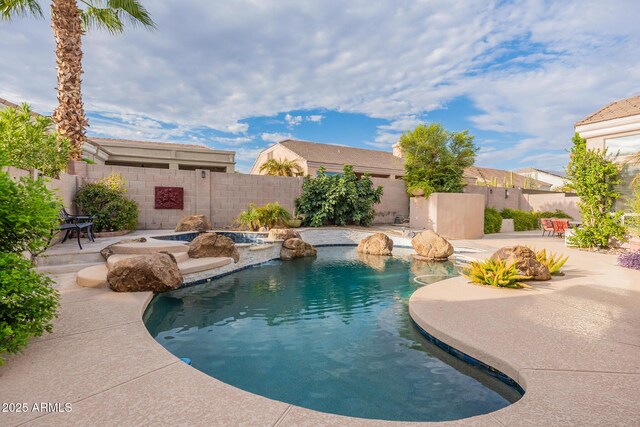 9678 E Voltaire Dr, Scottsdale, AZ 85260 - view of swimming pool with a patio, a fenced backyard, and a pool with connected hot tub
