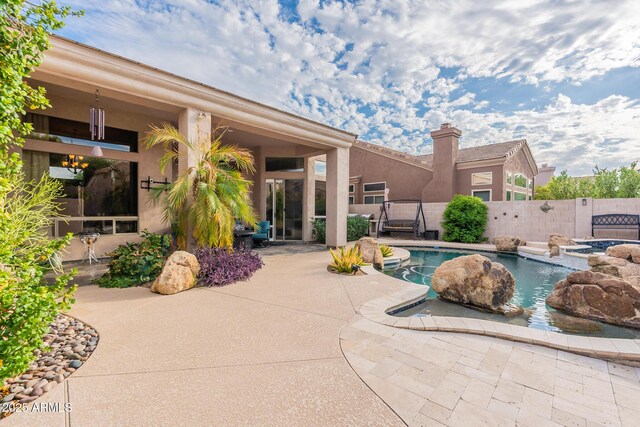 9678 E Voltaire Dr, Scottsdale, AZ 85260 - view of swimming pool featuring a patio