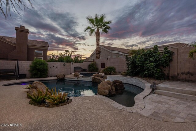 9678 E Voltaire Dr, Scottsdale, AZ 85260 - view of pool with a fenced backyard, a patio, and a pool with connected hot tub
