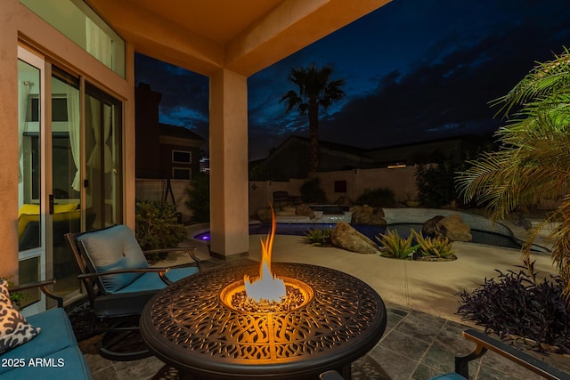 9678 E Voltaire Dr, Scottsdale, AZ 85260 - patio at night with a patio area and a fire pit