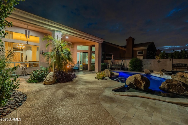9678 E Voltaire Dr, Scottsdale, AZ 85260 - pool at twilight featuring a patio